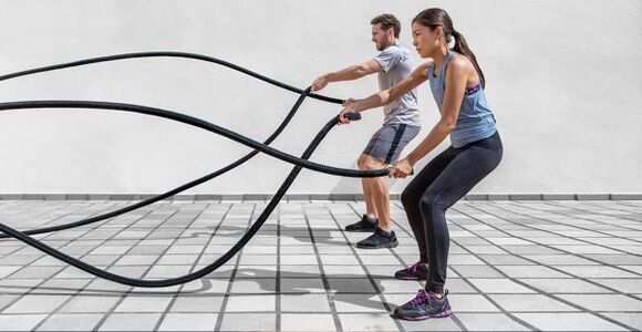 Man and woman do exercises